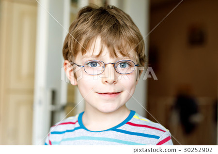 Portrait of little cute school kid boy with Portrait of little cute school kid boy with 30252902