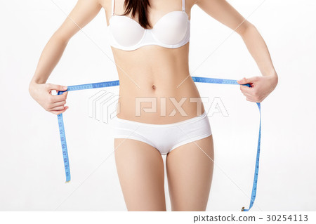 young woman measuring her perfect slim body iwith young woman measuring her perfect slim body iwith 30254113