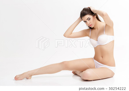 young beautiful brunette woman with long slender 30254222