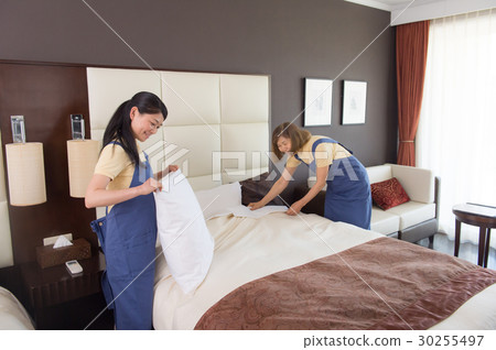 Hotel room staff woman 30255497