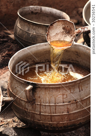 Making of sheabutter in Ghana / making shea butter in Ghana 30256541