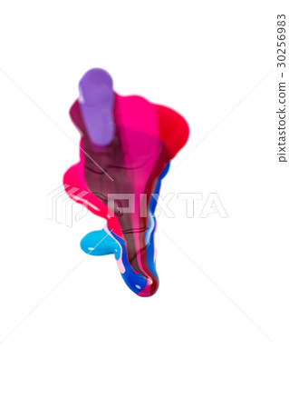 spilled colorful nail polish on white background 30256983