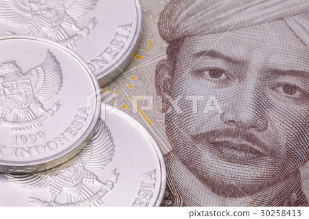 Indonesian rupiah  coins on the table. 30258413