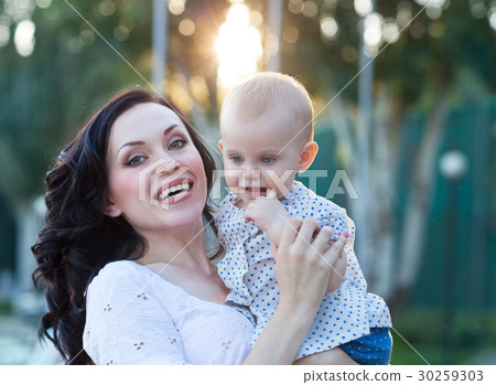 Portrait of a mother and her baby Portrait of a mother and her baby 30259303