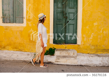 Woman goes along street 30270116