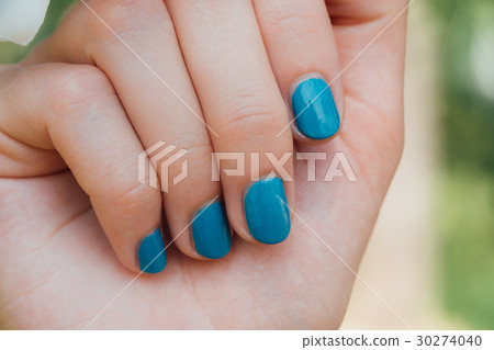 White plumeria Flower on hand With a turquoise 30274040