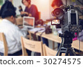 Video camera taking live video streaming  30274575