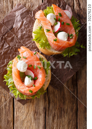 Sandwiches with salted salmon, mozzarella, frisee 30276210