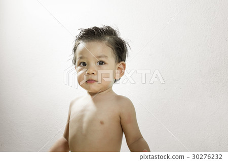 Baby Asia Boy Standing serious  poses on White Background. 30276232