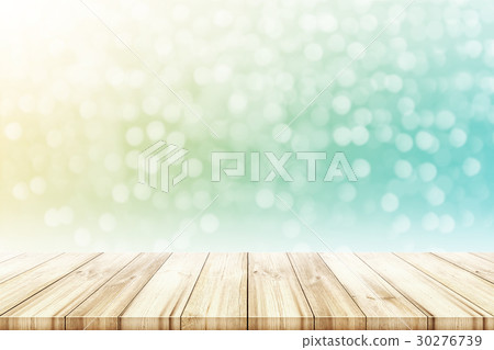 Empty wooden table top with blurred background Empty wooden table top with blurred background 30276739