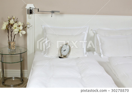 Alarm Clock on a Bed Alarm Clock on a Bed 30278870