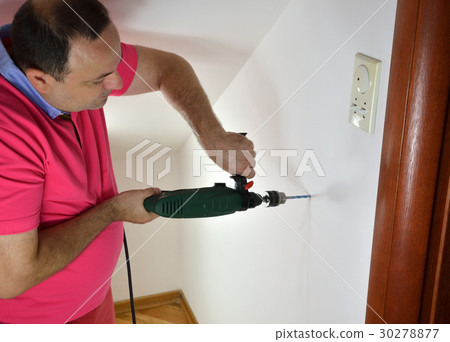 Drilling a Hole in a Wall 30278877
