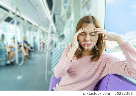 Portrait of young woman headache or carsick Portrait of young woman headache or carsick 30282398