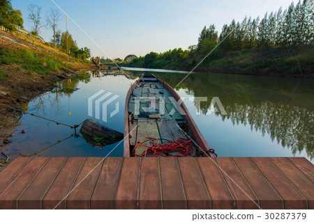 Wood table on landscape river Wood table on landscape river 30287379
