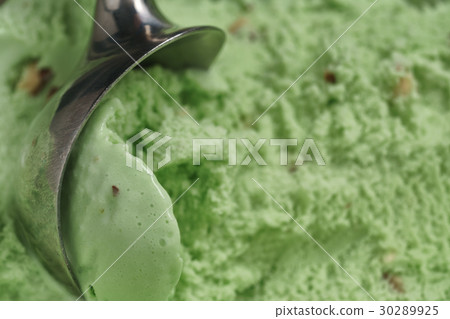 scooping natural pistachio ice cream closeup 30289925
