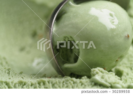 scooping natural pistachio ice cream closeup 30289938