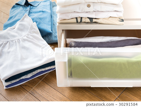 Clearing up clothes storage Organizing sorting Clearing up clothes storage Organizing sorting 30291584