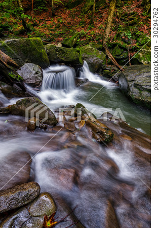 small cascade on the river among bouders small cascade on the river among bouders 30294762