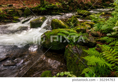 small cascade on the river among bouders small cascade on the river among bouders 30294763