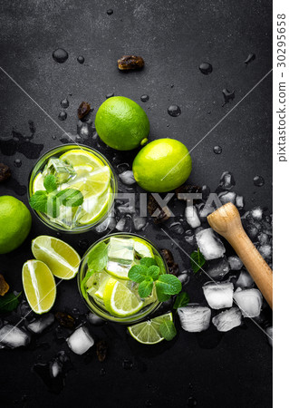 Refreshing mint cocktail mojito with rum and lime Refreshing mint cocktail mojito with rum and lime 30295658