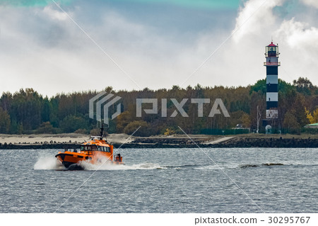Orange pilot ship moving at speed Orange pilot ship moving at speed 30295767