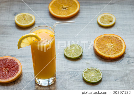 glass of orange juice on the wood background with glass of orange juice on the wood background with 30297123