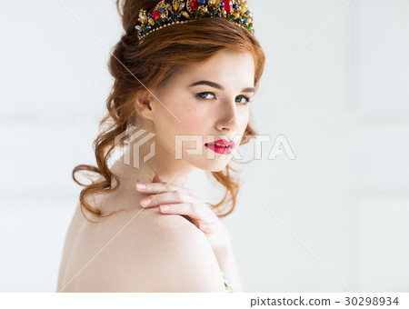 Beautiful redhaired fashion model posing  30298934