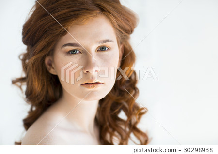 Beautiful young redhead woman  30298938