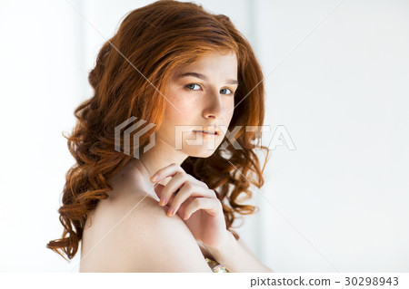 Beautiful young redhead woman Beautiful young redhead woman 30298943