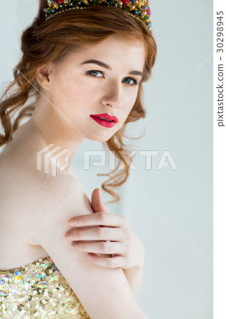 Beautiful redhaired fashion model posing Beautiful redhaired fashion model posing 30298945