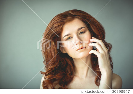 Beautiful young redhead woman Beautiful young redhead woman 30298947