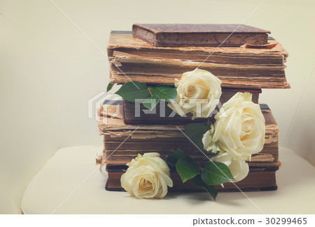 Old books with flowers Old books with flowers 30299465