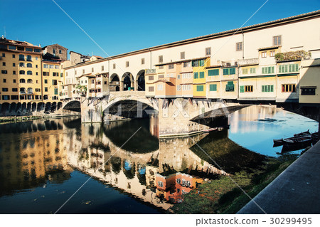 Ponte Vecchio is mirroring in river Arno, Florence 30299495