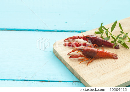 fresh crayfish on wood 30304413