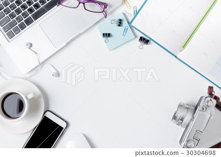 Modern white office desk table with laptop Modern white office desk table with laptop 30304698