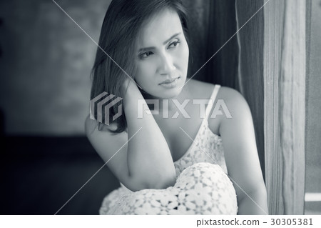 Sad woman 30305381