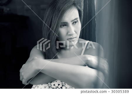 Serious sad woman Serious sad woman 30305389