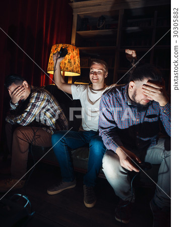 Video game over. Winner triumph, losers sadness 30305882