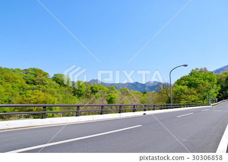 Spring to early summer drive Moving out mountain and under blue sky 30306858