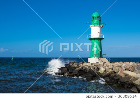 Mole on a stormy day in Warnemuende 30309514