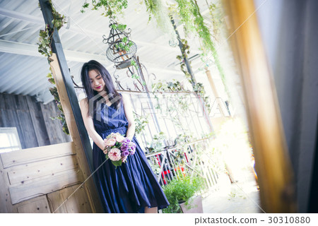 Women with green and bouquet Women with green and bouquet 30310880