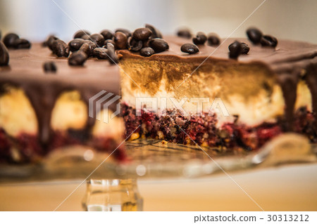 Delicious sweet baked cake with coffee beans Delicious sweet baked cake with coffee beans 30313212