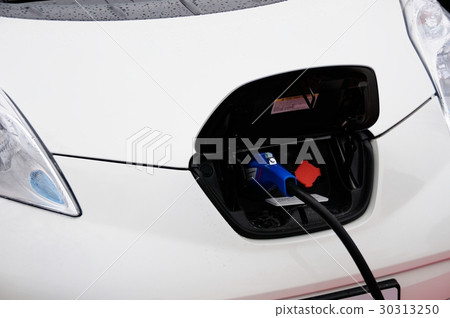 Eco car charging in progress 30313250