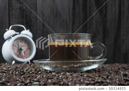 espresso in a glass on wooden table 30314855