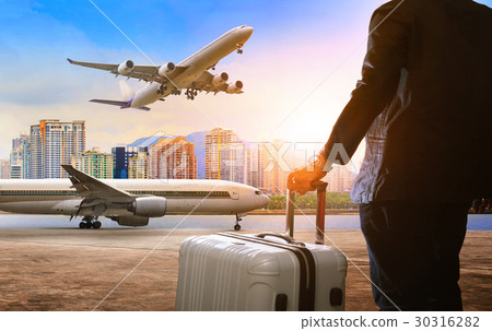 business man and traveling luggage in airport business man and traveling luggage in airport 30316282