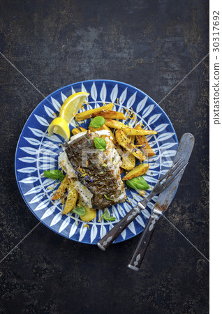 Halibut Filet with Fried Potatoes 30317692