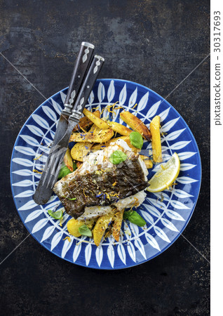 Halibut Filet with Fried Potatoes on Plate 30317693
