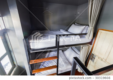 wide shot bunk bed with white pillow  30319608