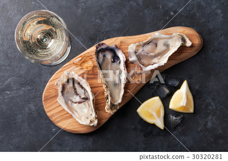 Oysters and wine 30320281