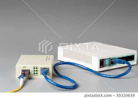 Media converter with optical patchcord and router Media converter with optical patchcord and router 30320639
